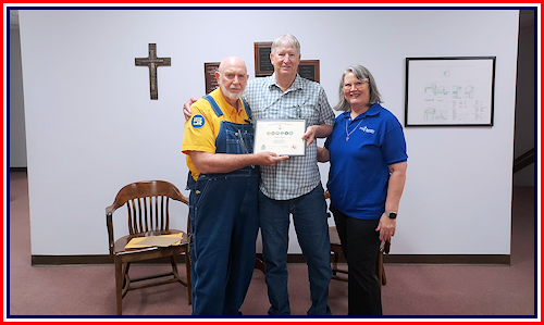 Secretary/Treasurer Rodney Love presents Military Appreciation Certificate to Rodney Reed with his wife Patti in attendance.  Rodney served 4 years in the US Navy.  His son, following in his footsteps is currently serving in the Navy.