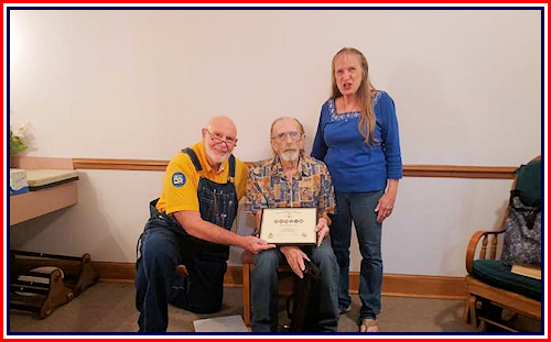 David Aaron (US Army, served 3 tours in Viet Nam) with his wife Dawn receives the Military Appreciation Certificate for Rodney Love.